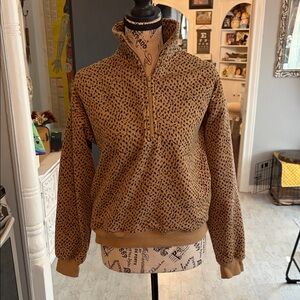 Fabletics Women's Cozy Fleece Half Zip Sweatshirt in a leopard or cheetah print